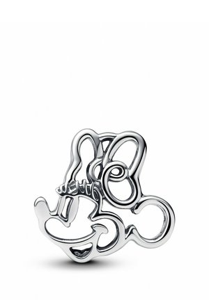 Silberner Metallpin in Form einer Cartoonfigur, mit geschwungenen Linien und Schlaufen, glänzender Oberfläche und minimaler Detailierung.