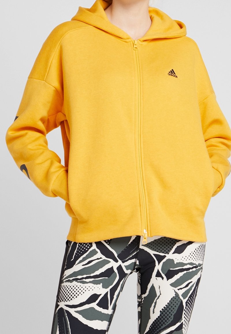 adidas Performance Felpa con zip - gold-coloured