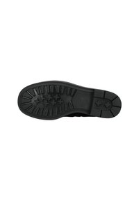 Suela de zapato de goma negra con un patrón de textura, que presenta acentos elevados y surcos para mayor tracción. Logo grabado cerca del talón.