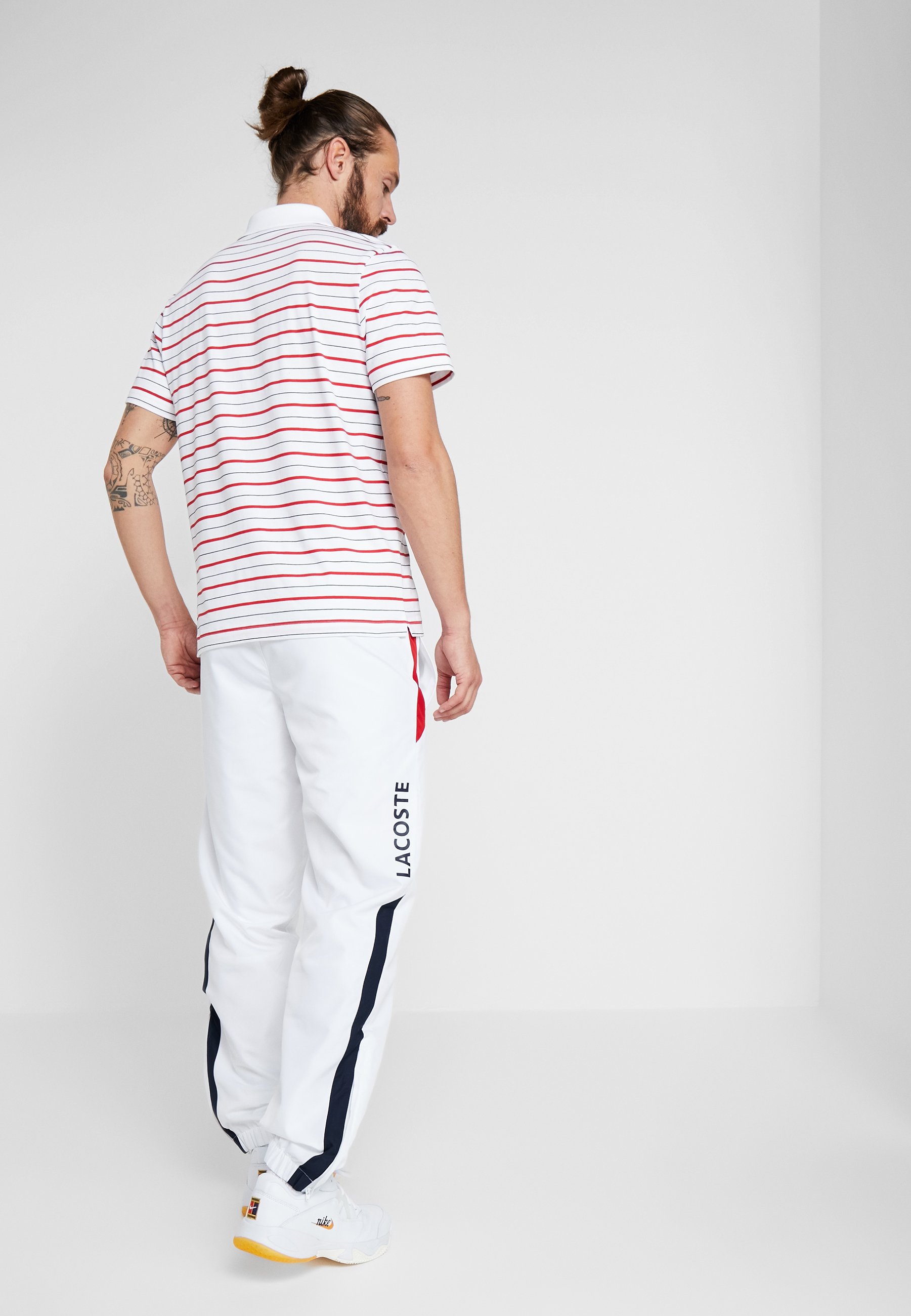 jogging lacoste blanc