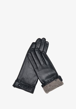 paar zwarte leren handschoenen met wollen manchetten, waarbij één manchet is omgevouwen om de grijze gebreide voering en de drukknopdetail te tonen.