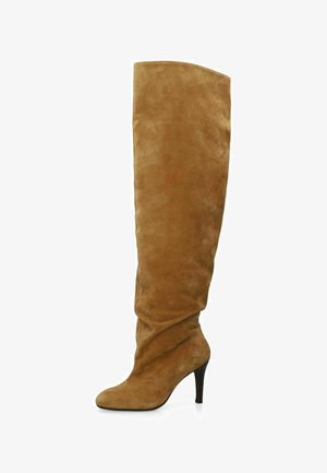 Tan suede knee-high boot with a pointed toe and a slender high heel.