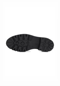 Schwarze Gummisohle mit tiefen Profilmustern, oval geformte Zehenpartie und Pluszeichen auf der Zwischensohle. Größe mit 38 gekennzeichnet.