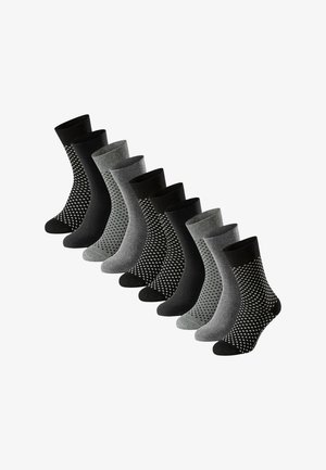 Dix paires de chaussettes en noir, gris foncé et gris clair. Présentent des motifs variés, y compris des textures et des designs à pois avec des bords côtelés.