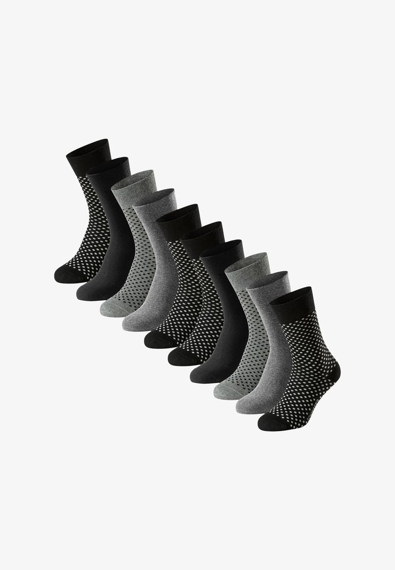 Ti par sokker i sort, mørkegrå og lysegrå. Har varierende mønstre, herunder teksturerede og prikkede designs med ribbede manchetter.
