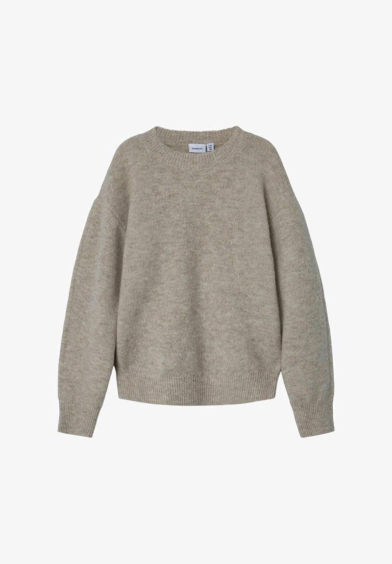 Beżowy sweter z okrągłym dekoltem, prążkowanymi mankietami i dołem. Wykonany z miękkiego materiału o puszystej fakturze, charakteryzujący się luźnym, swobodnym krojem.