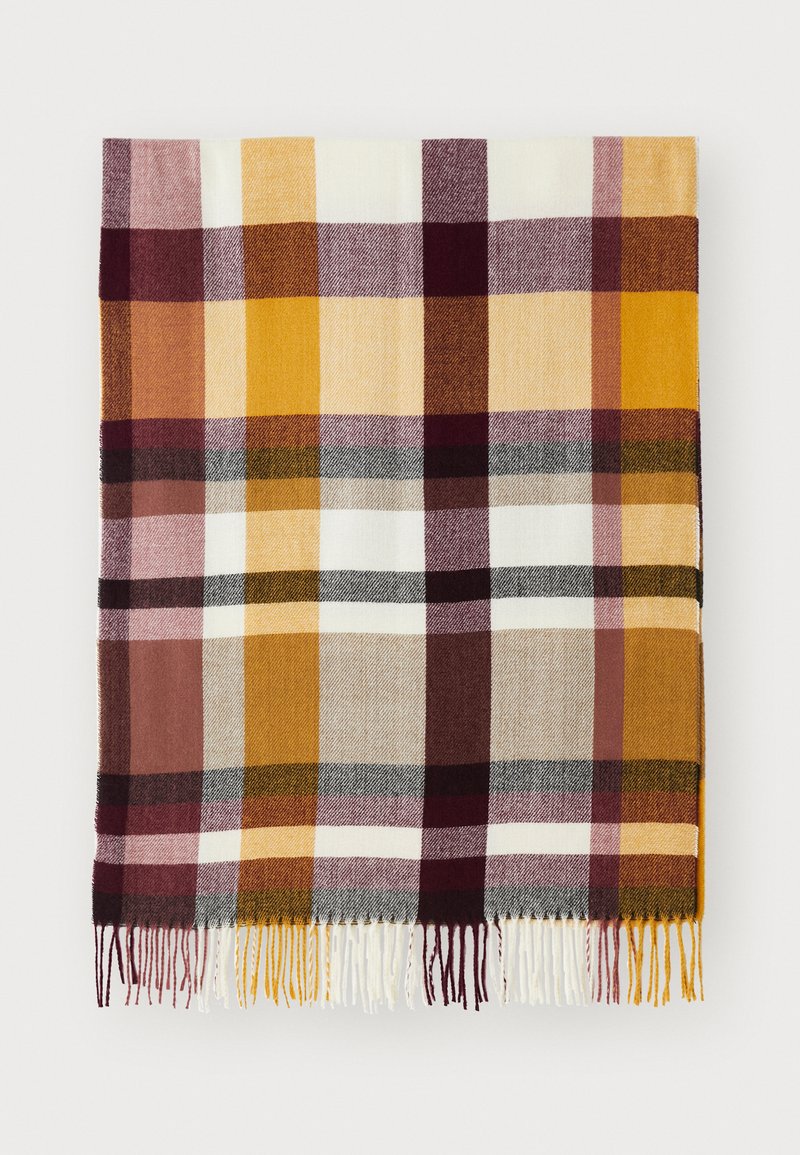 Plaid blanket featuring yellow, orange, burgundy, and gray squares. Finished with fringed edges and a soft, textured fabric.