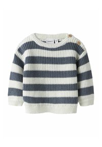 Maglione a righe in crema e blu navy, texture lavorata a maglia, colletto rotondo, maniche corte, con due bottoni in legno sulla spalla.