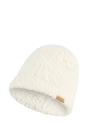 Soft, fluffy white fleece beanie with a small brown fabric tag on the side.