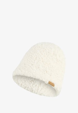 Soft, fluffy white fleece beanie with a small brown fabric tag on the side.