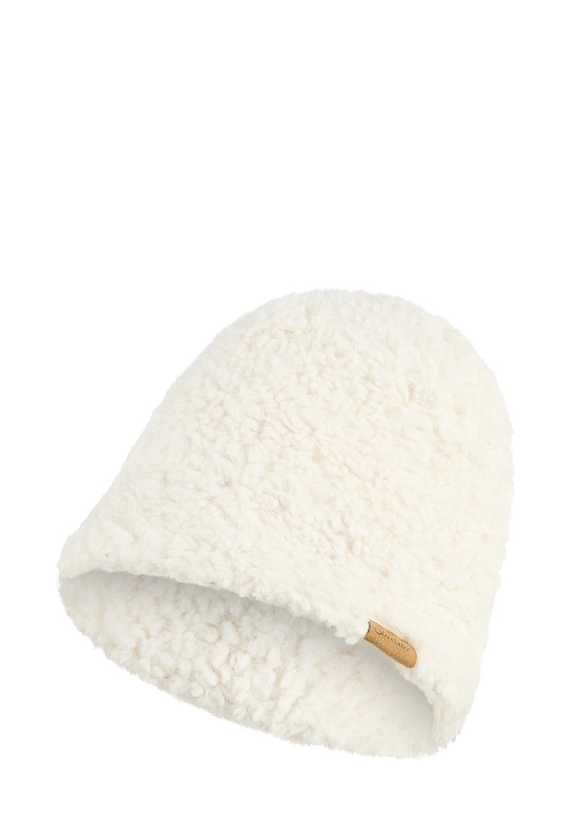Soft, fluffy white fleece beanie with a small brown fabric tag on the side.