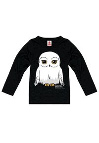 Black long-sleeve shirt featuring a white owl graphic with yellow eyes and gray accents; "Harry Potter" text at the bottom.