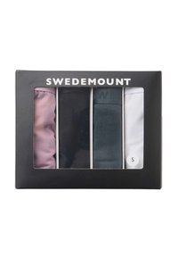 Ensemble de quatre paires de chaussettes dans une boîte présentant les couleurs rose, noir, vert foncé et blanc. Les chaussettes sont fabriquées en matériau doux avec une texture lisse.