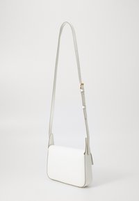 DKNY AVRIL CROSSBODY - Taška s příčným popruhem - marshmallow