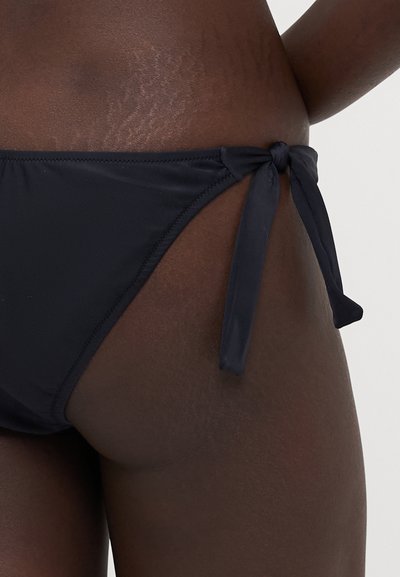 Black bikini bottom with a tie side, made of smooth fabric. Features clean lines and minimalistic design, suitable for swimwear.