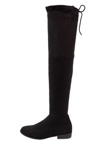 Bottine noire à la cheville, à bout rond, avec un talon bas et un cordon de serrage à l'arrière en haut.