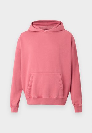 Pink hooded sweatshirt with a kangaroo pocket, ribbed cuffs, and hem. Made from soft, textured fabric. Simple design, no visible logos or patterns.