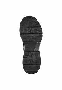 Semelle de chaussure en caoutchouc noir avec des rainures de traction profondes, des motifs circulaires et rectangulaires, et une section de talon lisse. Marque "s.Oliver" visible.
