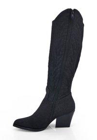Black knee-high boots made of textured fabric with a pointed toe, side zipper, and a chunky heel. Features decorative stitching.
