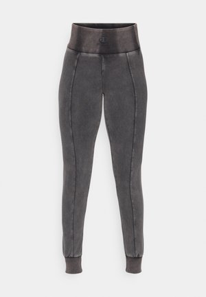Grå tights med høy elastisk linning, med kontrast-sømmer og ribbede mansjetter ved anklene for en tett passform.