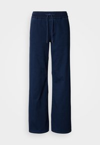 Pantalones azul marino de pierna ancha con cintura elástica y cordón. Textura suave sin patrones visibles ni detalles de herrajes.