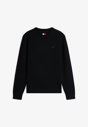 Svart genser med rund hals og lange ermer, med liten rød, hvit og blå logo på brystet og logolapp inne i kragen.