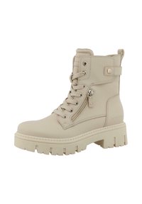 Beżowe botki za kostkę z grubą podeszwą, z przodem na sznurówki, bocznym zamkiem błyskawicznym i detalem paskowym. Wykonane z materiału syntetycznego o gładkiej fakturze.