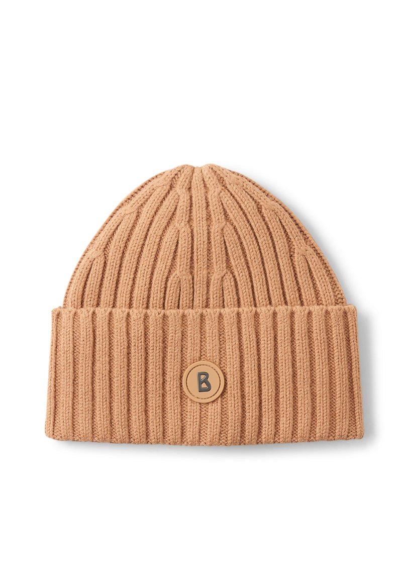 Beige knit beanie with ribbed texture and a folded cuff. Features a circular leather patch with a black "B" logo on the front.