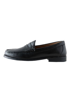Mocassin homme en cuir noir avec bout moc cousu, bride penny et petit talon empilé, vu de l'intérieur sur fond blanc.