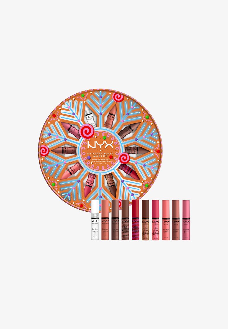 Runde Verpackung mit einem Lebkuchen-Design, die 10 verschiedene Lipglosse in den Farbtönen Pink, Nude und Braun enthält. Enthält einen weißen Lipgloss.