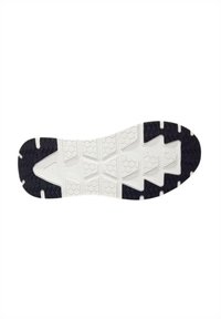 Suola della scarpa con una combinazione di colori bianco e nero, caratterizzata da un design testurizzato e pattternizzato con forme esagonali e triangolari per garantire aderenza.