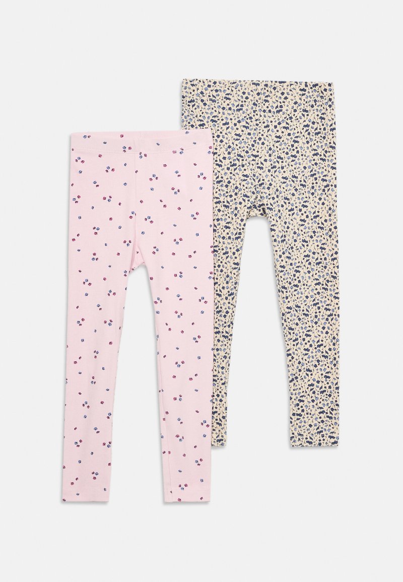 To sett med leggingser: rosa med små blomstertrykk, og kremfarge med marineblå og blå spredte blomsterdesign. Begge er laget av stretchy bomullsmateriale.