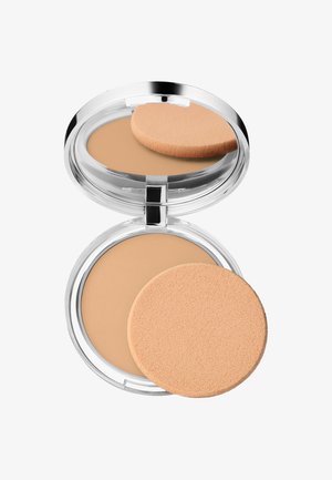 Poudre compacte dans un boîtier transparent avec un miroir, contient une poudre beige clair et une éponge applicatrice ronde et douce.