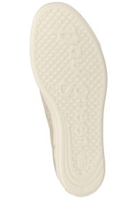 Suola di scarpa beige chiaro con motivo di grip testurizzato, caratterizzata da un nome del marchio impresso in rilievo. Realizzata in gomma con finitura leggermente lucida.