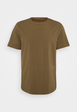 Braunes kurzärmliges T-Shirt mit Rundhalsausschnitt, aus weicher Baumwolle gefertigt. Verfügt über ein dezentes Logodetail auf der linken unteren Seite. Flacher Saum.