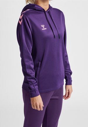 Lila atletisk hoodie med kängurufickor, justerbar dragsko för huvan och kontrasterande rosa axelränder. Mjuk och elastisk tyg.