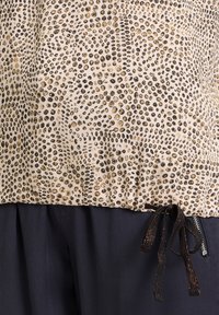 Cartoon 29267315 - Triko s potiskem - weiß braun