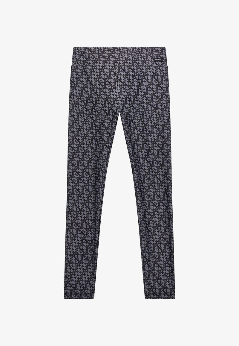 Mustat legginsit, joissa on monimutkainen, kaikilta osilta toisiinsa liitettyjen muotojen kuvio. Materiaali on sileä ja istuu hyvin.