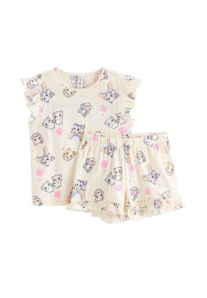 Børnepyjamasæt i cremefarvet med korte ærmer og shorts, med tegneseriefigurer af dyr, regnbuer, hjerter og flæsekant.