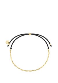 Aukso grandinėlė su reguliuojamu juodu virvutė ir mažą apvalų auksinį žavesį ant paprasto balto fono.