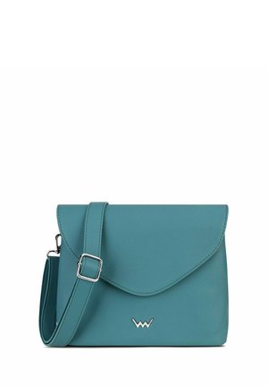 Teal crossbody leather bag with adjustable strap, flap closure, and small silver logo on front.