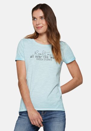 Light blue short-sleeve t-shirt with a round neckline and a printed text design reading "Rooftops all over the world" in dark font.