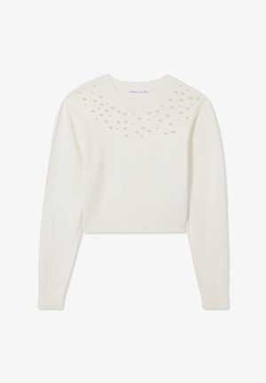 Pullover bianco a cropped con maniche lunghe, caratterizzato da decorative simili a perle nella zona delle spalle. Texture morbida e scollatura rotonda.