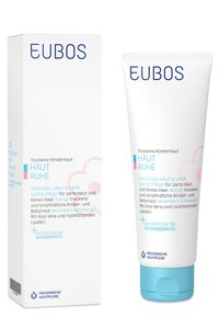 EUBOS kids' wash gel in a white tube with a blue cap, features blue lettering on a soft pink cloud background. Contains Aloe Vera.