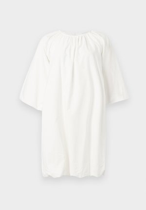 White cotton dress with a round neckline, three-quarter sleeves, and gathered detail at the neckline; loose, simple design.