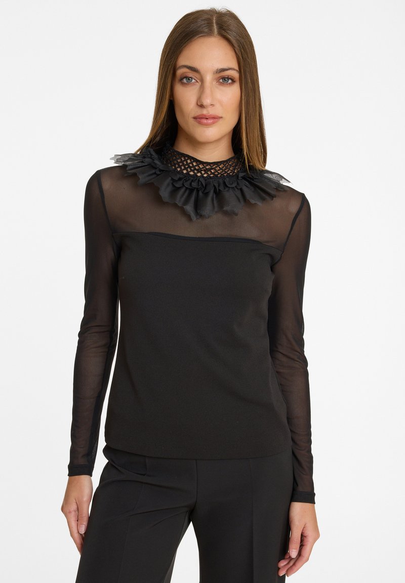 Schwarzes Langarmoberteil mit durchsichtigen Netzärmeln und einem gerafften Spitzenhalsausschnitt. Der Körper hat ein glattes, eng anliegendes Design.