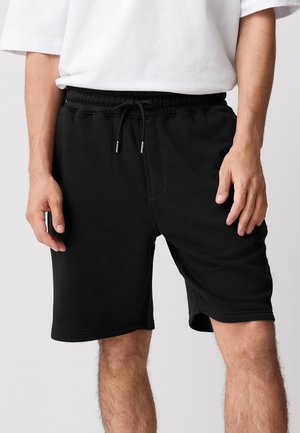 Next, REGULAR FIT - BRUSHED ZIP - Pantaloni sportivi - black