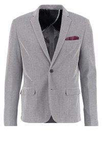 Herrtailorerad kavaj med svart och vit liten rutmönster, en knapp, klafffickor och bordeauxfärgad näsduk.