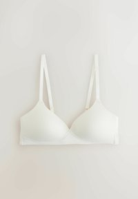 Hvid let polstret bh med justerbare smalle stropper og glatte skåle, lagt fladt på en neutral baggrund.