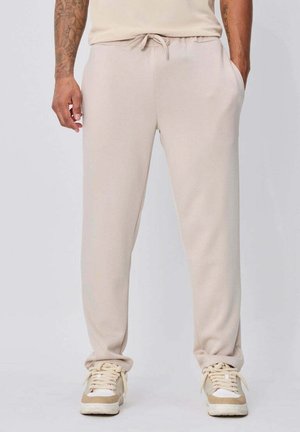 JOGGING UNI - Pantalon de survêtement - beige